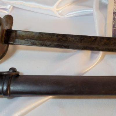 Lot164 Antique Sword & Scabbard
believed to be Civil War Era measures: 43