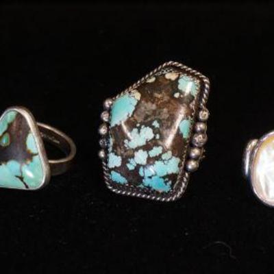 1309	5 STERLING RINGS CONTAINING TURQUOISE, MOTHER OF PEARL, BLACK ONYX, ETC, 1.511 OZT INCLUDING STONES
