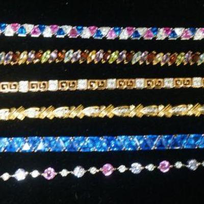 1286	LOT OF 5 STERLING SILVER BRACELETS W/COLORFUL STONES, LONGEST APPROXIMATELY 8 1/2 IN, 3.08. OZT INCLUDING STONES
