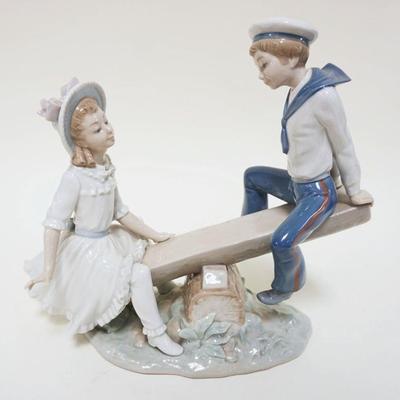 1024	LLADRO PORCELAIN FIGURE OF BOY & GIRL ON SEE-SAW, ONE FINGER DAMAGED, APPROXIMATELY 10 IN HIGH
