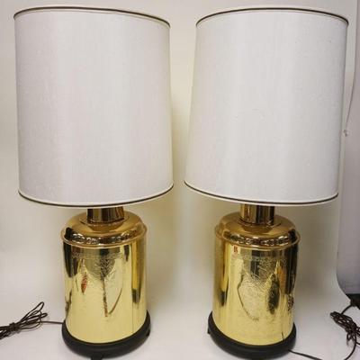 1098	PAIR OF CONTEMPORARY ASIAN BRASS TEA CADDY STYLE TABLE LAMPS, SEPARATION ON TOP OF ONE BRASS RING, APPROXIMATELY 34 IN HIGH OVERALL

