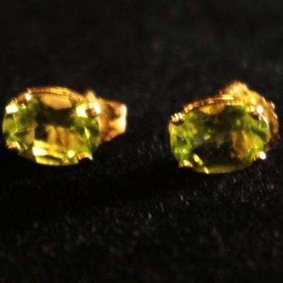 1297	PAIR OF 14K YELLOW GOLD PIERCED EARRINGS CONTAINING EMERALDS, 0.5 DWT INCLUDING STONES
