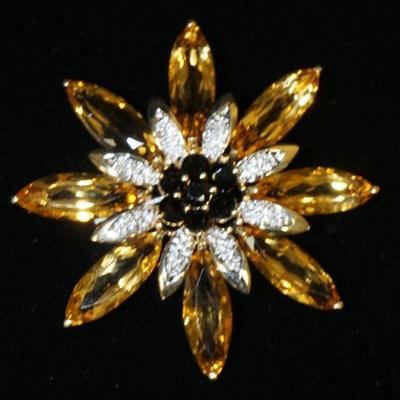 1176	14K YELLOW GOLD FLORAL BROOCH PIN CONTAINING EIGHT MARQUISE CUT CITRINES SEVEN ROUND CUT SMOKEY QUARTZ & APP. 0.04 CARATS OF...