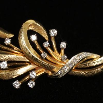 1186	14K YELLOW GOLD BROOCH PIN CONTAINING APP. 0.15 CARATS OF DIAMONDS. OVERALL WEIGHT 6.15 DWT. APP 2 IN L 
