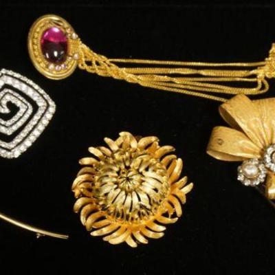1217	LOT OF BROOCH/PINS, 5 COSTUME & ONE STERLING 0.125 OZT, LOT INCLUDES GOLD PLATED, ONE HAIR PICK MARKED MIRIAM HASKELL
