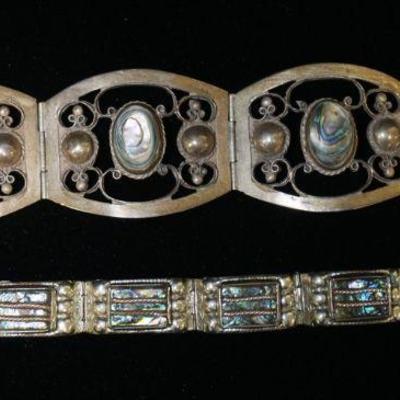 1279	2 STERLING & ABALONE BRACELETS MARKED MEXCO, 1.955 OZT OVERALL, LARGER BRACELET IS APPROXIMATELY 8 IN LONG
