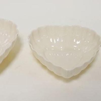 1053	BELLEEK IRISH CHINA, NEST OF 3 HEART SHAPED DISHES, BROWN MARK, LARGEST APPROXIMATELY 6 1/2 IN X 7 IN X 2 IN HIGH
