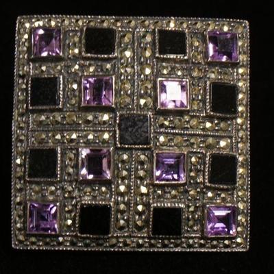 1193	STERLING SILVER BROOCH W/PURPLE & BLACK STONES, SIGNED JUDITH JACK, APPROXIMATELY 1 3/4 IN SQUARE
