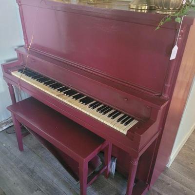Upright piano and bench