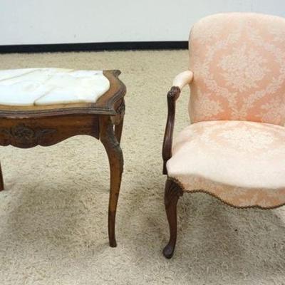 1212	LOT OF UPHOLSTERED ARM CHAIR AND INSET MARBLE TOP TABLE WITH METAL MOUNTS AND TRIM, LOSS TO TRIM
