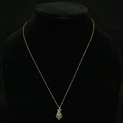 1111	14K YELLOW GOLD NECKLACE W/PENDANT CONTAINING ONE CABOCHON JADE, 1.2 DWT INCLUDING STONE, CHAIN APPROXIMATELY 20 IN LONG
