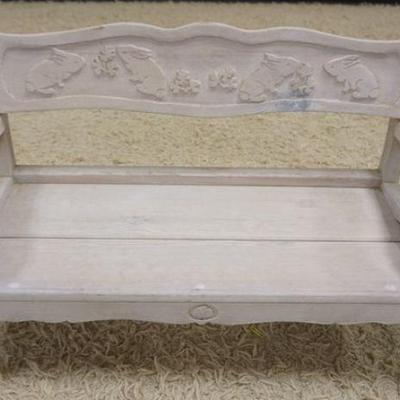 1214	CHILDS SIDE PINE BENCH WITH CARVED RABBITS SMELLING FLOWERS ON BASE, APPROXIMATELY 13 IN X 29 IN X 17 IN H

