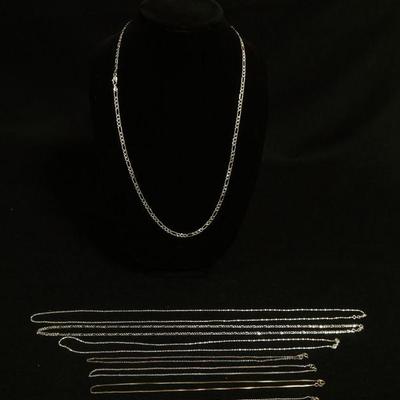 1132	8 STERLING SILVER CHAINS, 1.145 , LONGEST CHAIN APPROXIMATELY 30 IN
