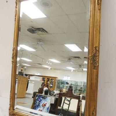 1205	WALL MIRROR IN GILT DECORATED FRAME, APPROXIMATELY 33 IN X 47 IN
