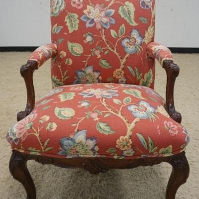 1184	FRENCH PROVINCIAL UPHOLSTERED ARM CHAIR WITH FORAL UPHOLSTERY AND CARVED FRAME
