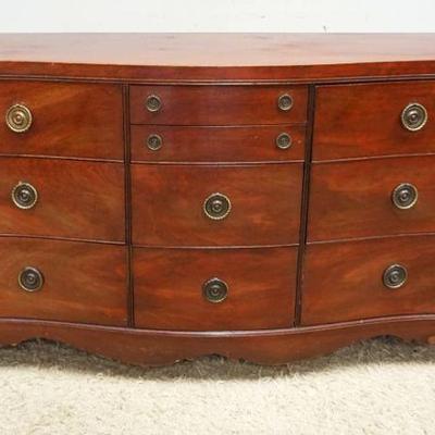 1013	MAHOGANY LOW CHEST, 10 DRAWER W/SERPENTINE FRONT & BELL FLOWER INLAY, SOME VENEER LOSS AT BASE, APPROXIMATELY 62 IN X 22 IN X 34 IN...