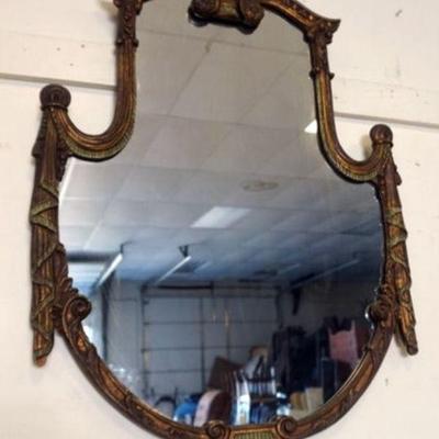 1291	HANGING MIRROR IN ORNATE GESSO FRAME WITH BASKET AND FLOWER CREST AND DRAPE SIDES, APPROXIMATELY 29 IN X 43 IN
