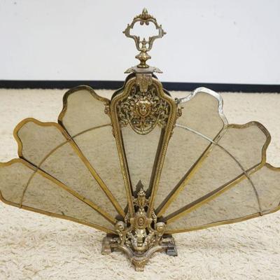 1008	ORNATE BRASS PEACOCK FIRE SCREEN, APPROXIMATELY 26 IN HIGH
