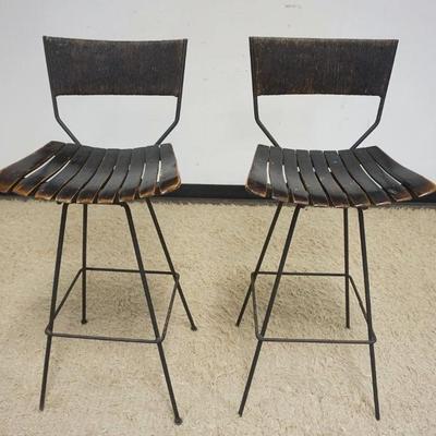 1018	PAIR OF MIDCENTURY MODERN BAR STOOLS, METAL W/BENTWOOD SEATS & WOVEN BACK REST, APPROXIMATELY 41 IN HIGH
