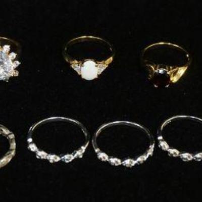 1094	12 STERLING SILVER RINGS, 1.460 OZT INCLUDING STONES
