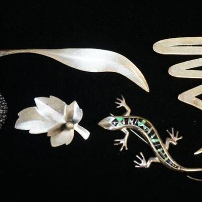 1092	5 STERLING SILVER BROOCHES/PINS INCLUDES 2 IN THE FORM OF LEAVES SIGNED JEWEL ART & ONE IN THE FORM OF A PORCUPINE, 1.791 OZT
