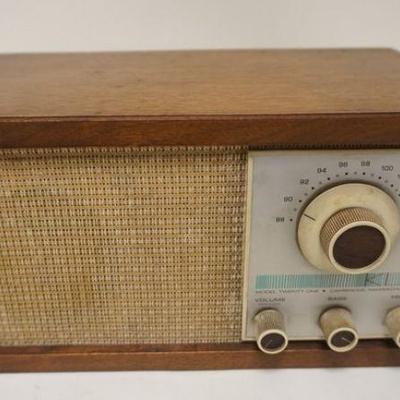 1293	KLH MODEL TWENTY ONE TABLE RADIO, UNTESTED AND SOLD AS IS, APPROXIMATELY 7 IN X 12 IN X 6 1/2 IN H

