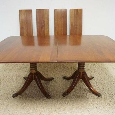 1044	STICKLEY SOLID CHERRY DINING TABLE W/4 LEAVES, APPROXIMATELY 73 IN X 39 IN X 30 IN HIGH
