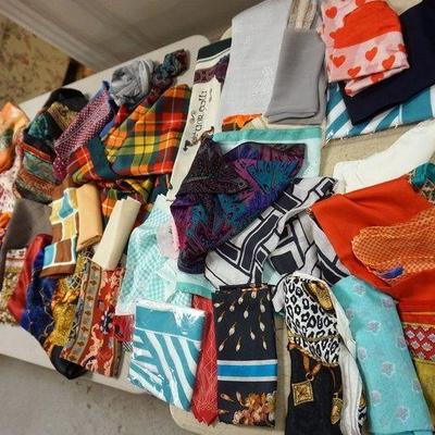 1299	LARGE LOT OF ASSORTED SILK SCARES
