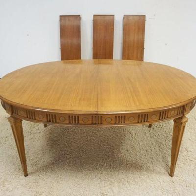 1057	OVAL BANDED FRUITWOOD DINING TABLE W/4-12 IN LEAVES, APPROXIMATELY 45 IN X 65 IN X 30 IN HIGH
