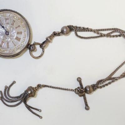 1129	ANTIQUE SWISS 935 SILVER FAST FLOW POCKET WATCH, THE WATCH CHAIN IS MARKED SOLID SILVER ON THE CLASP

