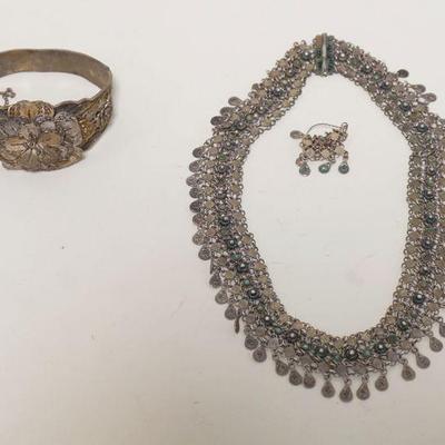 1162	900 & STERLING SILVER JEWELRY LOT. LOT INCLUDES A BRACELET MARKED 900 SILVER WEIGHT 1.029 TROY OUNCES & A NECKLACE W/ ONE EARRING...