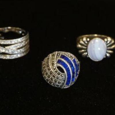 1136	7 STERLING SILVER RINGS, 1.80 OZT INCLUDING STONES
