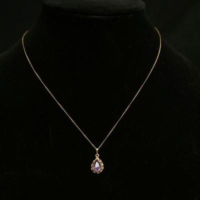 1090	14K YELLOW GOLD NECKLACE W/PENDANT CONTAINING AMETHYST STONE, 1.5 DWT OVERALL, CHAIN APPROXIMATELY 18 IN LONG
