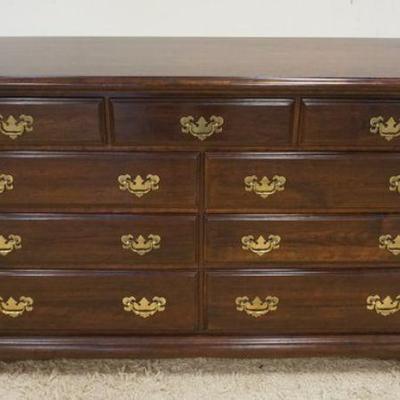 1181	CHERRY 9 DRAWER LOW CHEST, APPROXIMATELY 19 IN X 56 IN X 34 IN H
