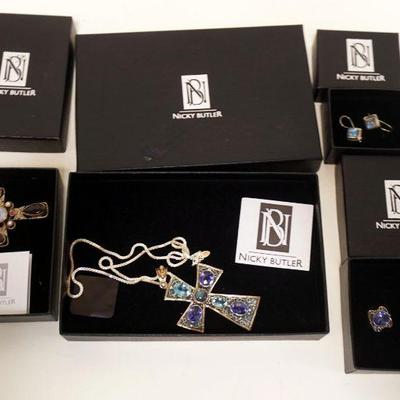 1152	NICKY BUTLER STERLING JEWELRY LOT. LOT INCLUDES TWO NECKLACES W/ CROSS PENDANTS (CHAINS APP. 18 IN L) & TWO PAIRS OF EARRINGS
