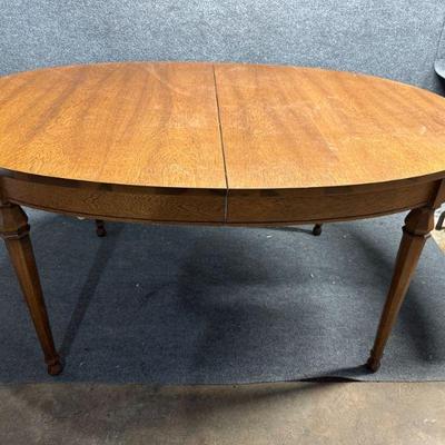 Oval Wooden Dining Room Table 42â€™â€™x60â€™â€™x29.5â€™â€™ Has some surface wear
