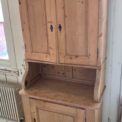 Polished pine cupboard