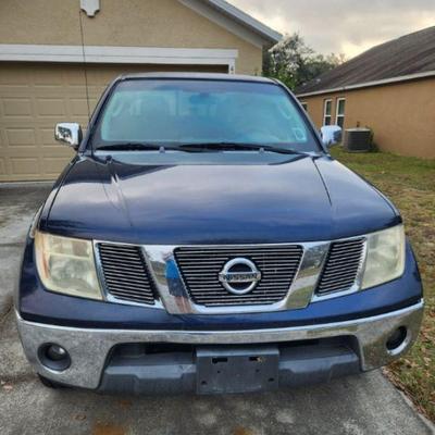 2006 Nissan Fronteir LE 
Mileage 211,400.  This truck has a brand new  exhaust, new tires, front brakes.   It needs rear brakes, gas tank...