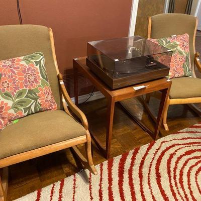 Matching rocking chairs, one with burnt orange fabric, 2 with moss green fabric