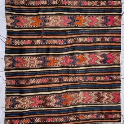 Vintage hand-woven rug would also look great hung as a tapestry