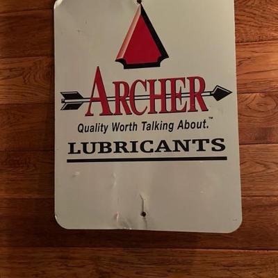 Metal advertising sign.
