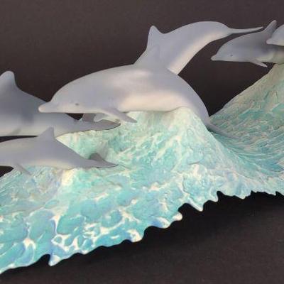 John Perry Dolphins on Blue Waves Sculpture
