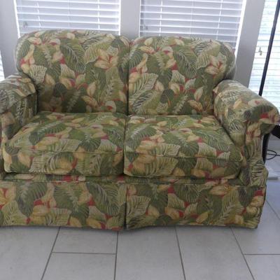 Bassett Love Seat with Leaf Pattern in Greens/Red Highlights
