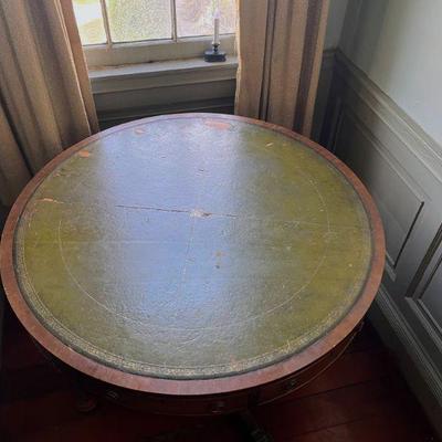 Green leather top round table. Needs Refurbishment. 