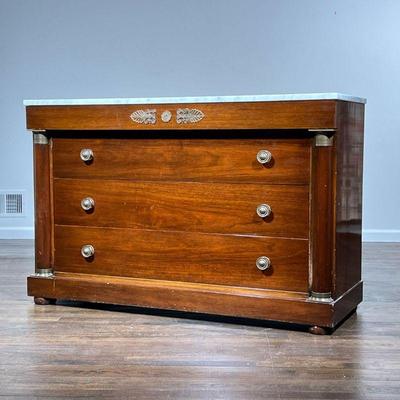 EMPIRE CHEST OF DRAWERS | With white marble top, blind top drawer with brass Rossetti and other mounts over three full width drawers,...