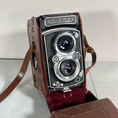 ROLLEIFLEX TLR CAMERA | Vintage Rolleiflex twin reflex lens 6x6 film camera with Zeiss Tessar 75mm lens in leather carrying case, medium...