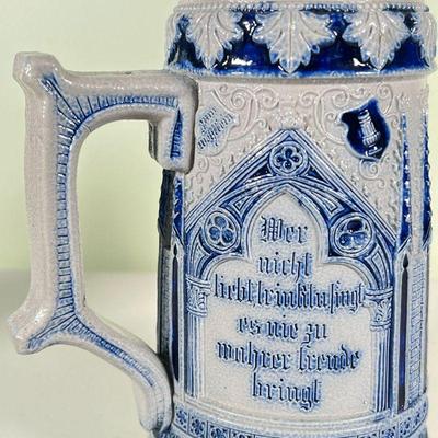 (4pc) METTLACH STEINS | Four blue and grey stoneware Mettlach steins from Germany, with pewter lids (one missing); depicting drinking...