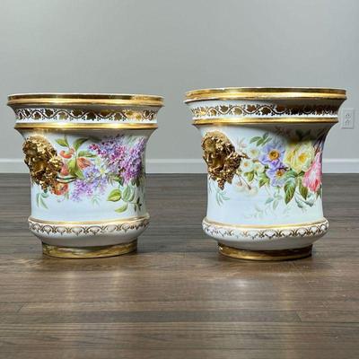 (2pc) PAIR GILT PAINTED JARDINIERES | Each decorated with hand painted blooming flowers and vines with gilt highlights, and outset...