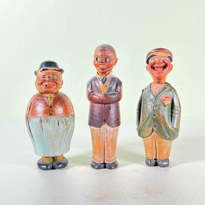 (3pc) ANRI THREE STOOGES | Three wood carved funny guys with detachable heads revealing: cork stopper, bottle opener, and corkscrew;...