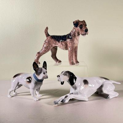 (3pc) PORCELAIN DOG TRIO | Dahl Jensen Airedale Terrier #1079; Vintage Metzler Ortloff French Bulldog; porcelain Great Dane marked...